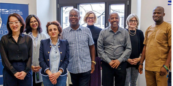 New Senior Fellows Eight smiling people at the UA Ruhr's College of Social Sciences and Humanities